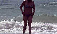 mature beauty on beach shows off, masturbates, then gets fucked by lover
