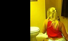 An amateur blonde shakes her big ass on private webcam.