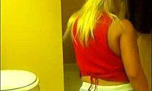 An amateur blonde shakes her big ass on private webcam.