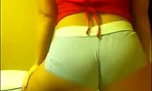 An amateur blonde shakes her big ass on private webcam.