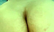 mature woman relaxing while husband works