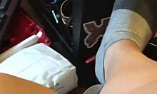 I try to catch my man's attention with my feet while he streams live, using toes and socks in a playful game.