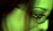 young girl in lingerie and glasses poses