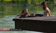 two women enjoy quiet outdoor time together on secluded pier