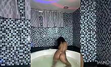 amateurs indulge in oral fun during a steamy hydro massage session