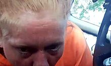 Outdoor car scene with amateur performers in public street setting