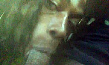 Amateur deepthroats big black cock outdoors