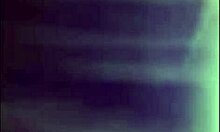 Young Couple Engages in Intimate Bedroom Action