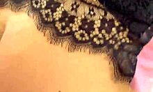 Curly blonde dances funk in pajamas in the kitchen