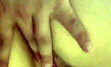 Curly blonde dances funk in pajamas in the kitchen