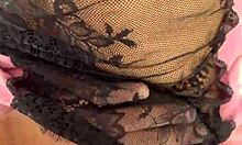 Curly blonde dances funk in pajamas in the kitchen