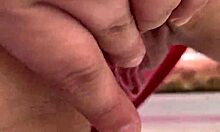 Curly blonde dances funk in pajamas in the kitchen