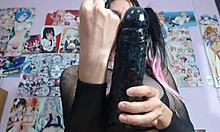 A sissy crossdresser flaunts big tits in a miniskirt