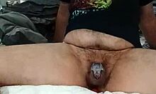 Gay couple explores BDSM play with toys and chastity