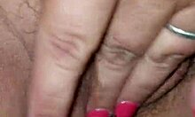 Slut babe plays with her wet pussy at home