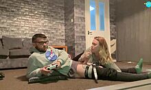 Gaming while my petite teen girlfriend sucks my cock