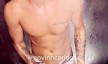 Brazilian twink feels aroused stripping naked in shower after TikTok fame. Natural tits on display.