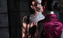 Two women in cosplay have fun with water sex and big tits