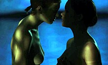 Two women in cosplay have fun with water sex and big tits