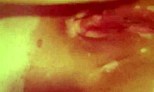 horny housewife passionately fucks her dildo in this homemade video, craving more intense pleasure.