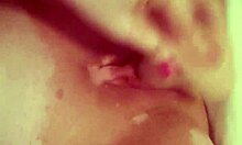 horny housewife passionately fucks her dildo in this homemade video, craving more intense pleasure.