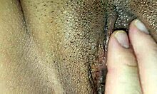 She's playing with her juicy pussy