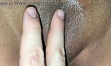 She's playing with her juicy pussy