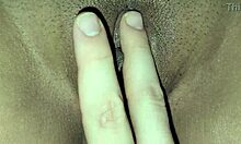 She's playing with her juicy pussy