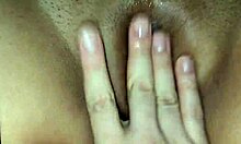 She's playing with her juicy pussy