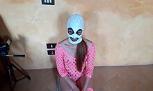 Masked petite teen in pink fishnet catsuit and platform boots gives rough pov blowjob to skinny guy