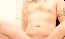 Tattooed twink pet is tied up in bondage, humiliated with pissing in gay BDSM scene.