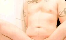 Tattooed twink pet is tied up in bondage, humiliated with pissing in gay BDSM scene.