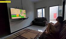 Young girl relaxes on couch with legs open