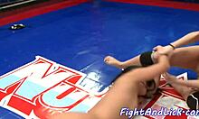 Two busty lezzies wrestle and finger each other's pussies in a hot catfight