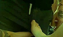 Redhead performs footjob with finger licking