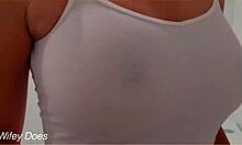 Watch my wife in the shower with her wet shirt and big tits?