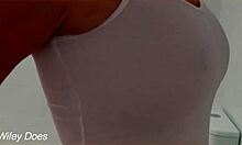 Watch my wife in the shower with her wet shirt and big tits?