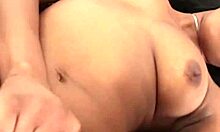 Ebony babe masturbates solo on mobile video