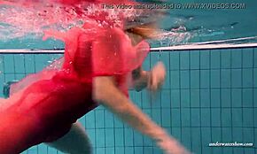 duna bultihalo shines as an underwater beauty in a bikini. her wet, clothed look by the pool captivates.