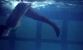 lozhkova teases in see-through shorts while swimming in the pool