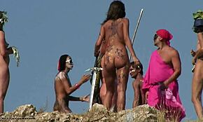Wow, nudist chicks as warrior goddesses posing on a hill
