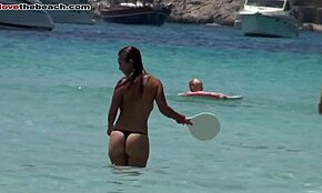 Amateur girl with firm butt enters the sea