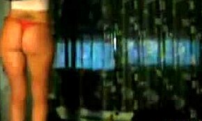 Look At This Inked Whore In Red Thong Shaking Her Amazing Ass On Webcam