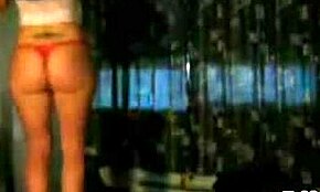 Look At This Inked Whore In Red Thong Shaking Her Amazing Ass On Webcam