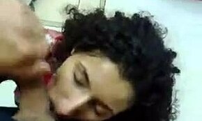 Horny curly brunette slut sucks big fat dong clothed in pov