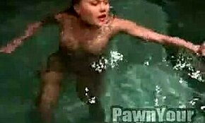 Blondie performs intense fellatio in wet swimming pool scene.