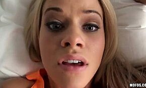 bimbo in bathroom playing with dildo on bed.