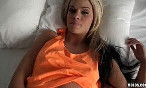 bimbo in bathroom playing with dildo on bed.