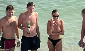 Black panties amateur hottie smokes and poses naked on hidden beach