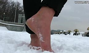 Hot Bitch Strolls Barefoot On Snow – Provocative!